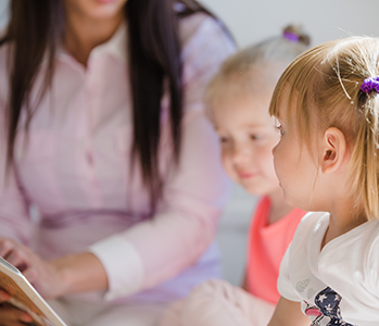 small-kids-with-nurse-in-preschool